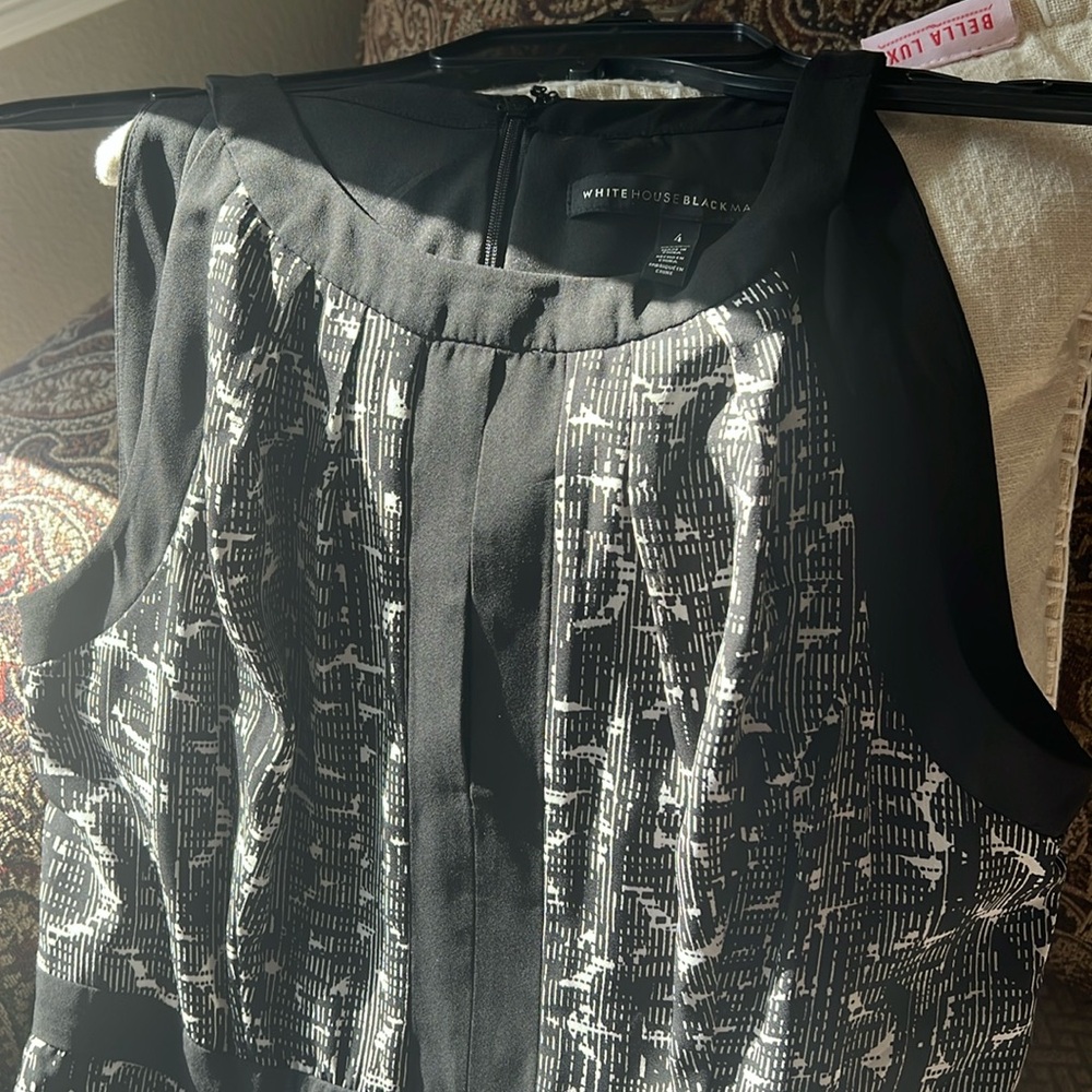 NWT size 4 new White House Black Market long dress. Chiffon with slit in front